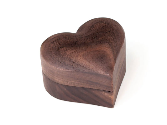 Heart-shaped wooden ring gift box, perfect for presenting jewelry, made from lovely walnut wood.