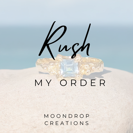 Diamond ring with 'Rush My Order' text and 'Moondrop Creations' branding on a light blue and white background.