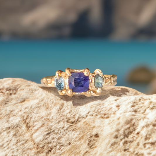 Elegant Blue Sapphire and Tourmaline engagement ring in Solid 14k Gold, showcasing natural stones with a rustic design.