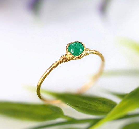 Dainty emerald stacking ring featuring a 4mm natural green emerald set in a 14k gold filled band.
