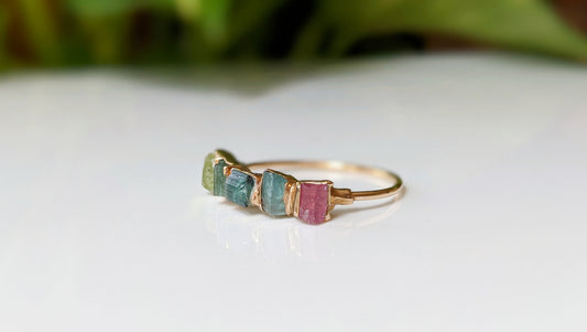 Stylish Raw Tourmaline eternity ring with multi-color stones set on a 14k gold filled band.