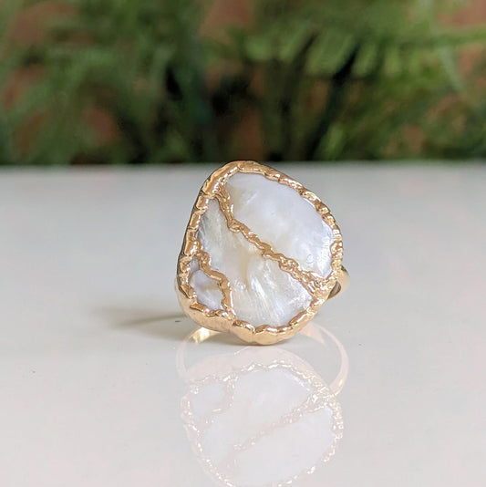 Handcrafted Mother of Pearl Kintsugi ring on a 14k Gold-filled band, perfect for gifts and special occasions.