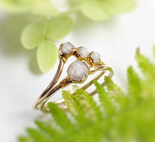 Raw diamond chevron wedding ring set with uncut diamonds and 18k gold bands, handcrafted and ethically sourced.