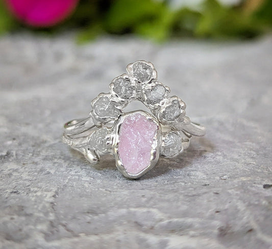Raw pink Morganite and diamond wedding ring set on sterling silver band, showcasing unique Chevron design.
