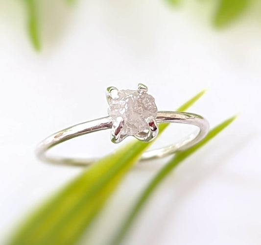 Sterling Silver raw diamond ring featuring a 5-6mm conflict-free diamond on a delicate prong band.