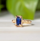 Handcrafted Blue Sapphire cocktail ring in solid 14k gold, featuring an emerald shape lab-created Sapphire with textured band.