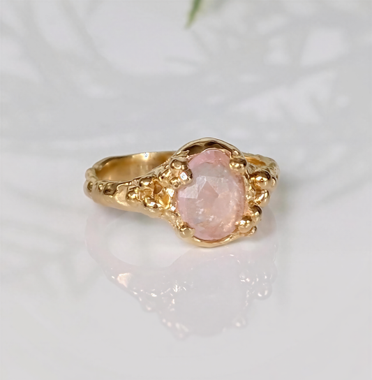 Handcrafted pink Morganite ring in solid 14k gold, featuring oval rose cut gemstone and textured band.
