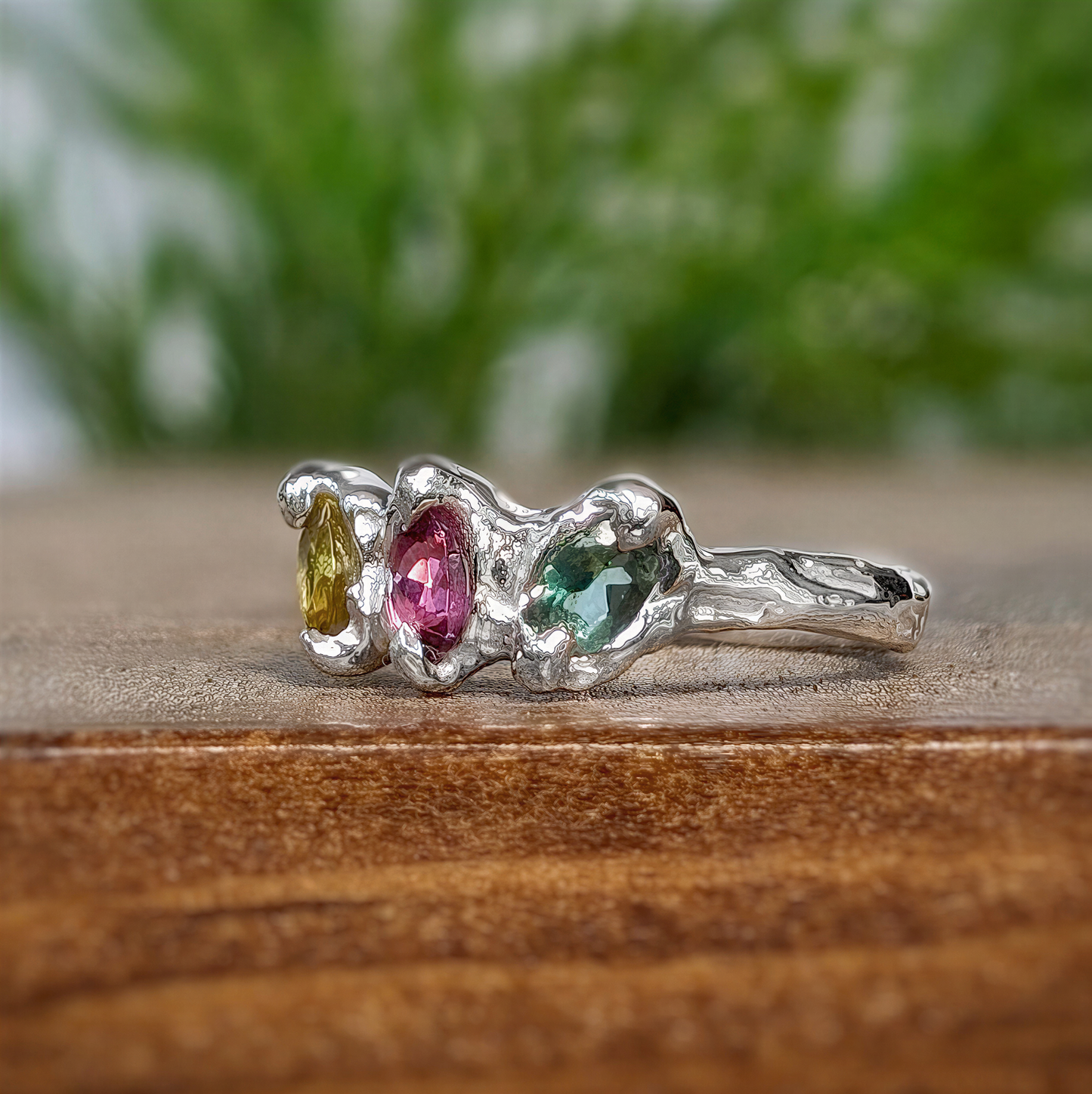 Natural multi Tourmaline and silver ring with three colorful gemstones in an organic design.