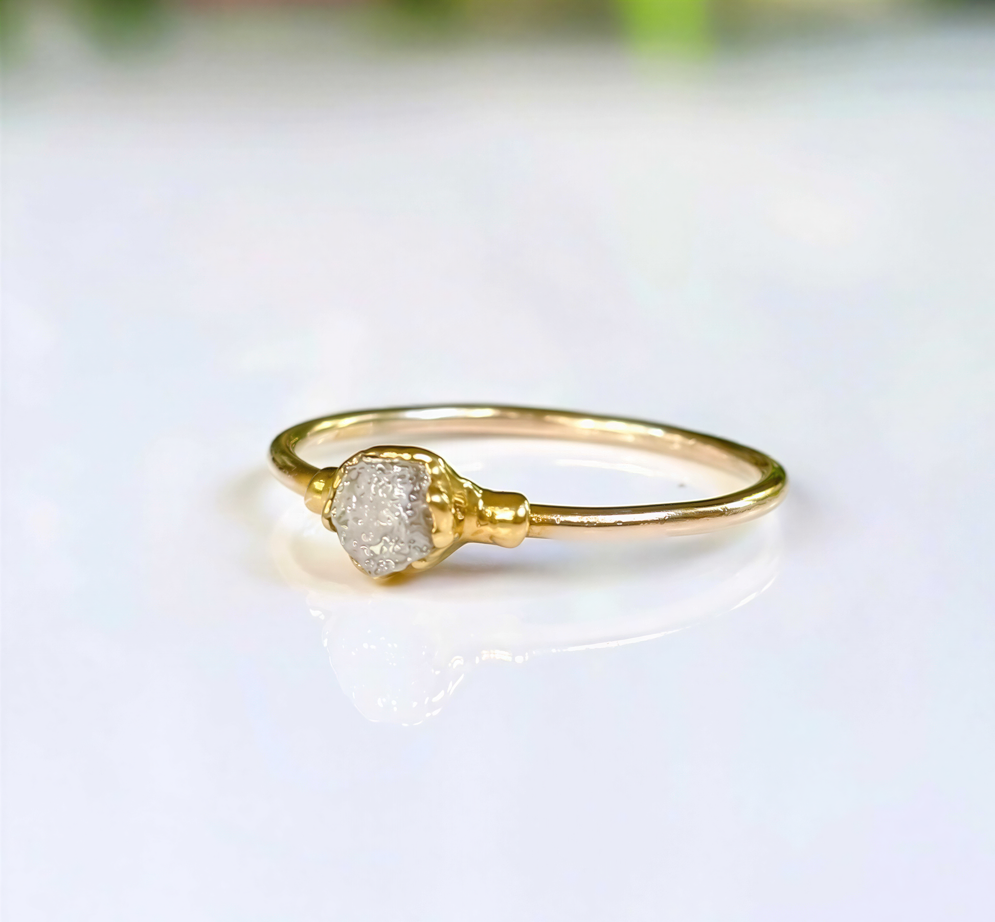 Rustic raw diamond engagement ring in solid 14k gold, featuring a unique crystal design for a romantic touch.