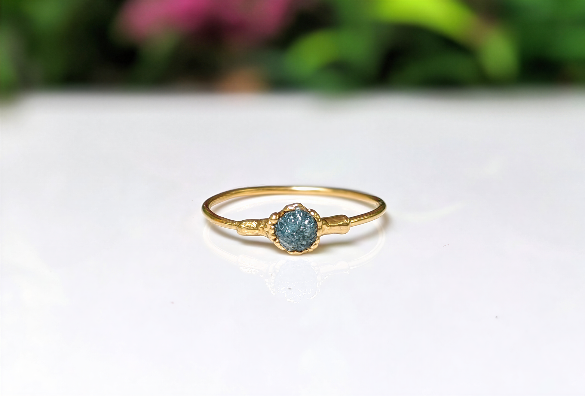 Raw blue diamond engagement ring on solid 18k gold band, handcrafted and unique, perfect for Valentine's Day.