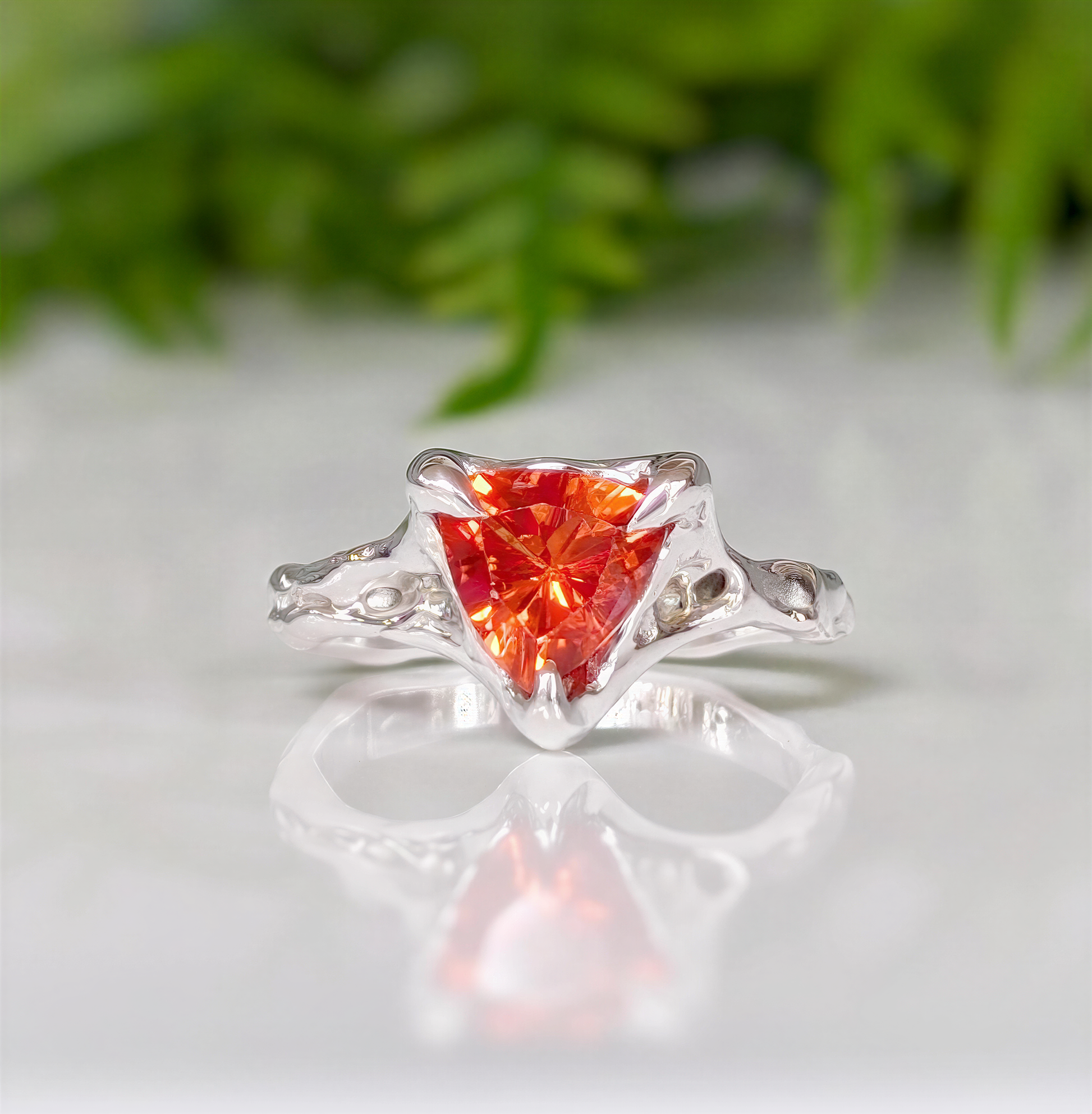 Trilliant cut Orange Sapphire ring in Solid 14k Gold, featuring a unique molten textured band, perfect for engagements.