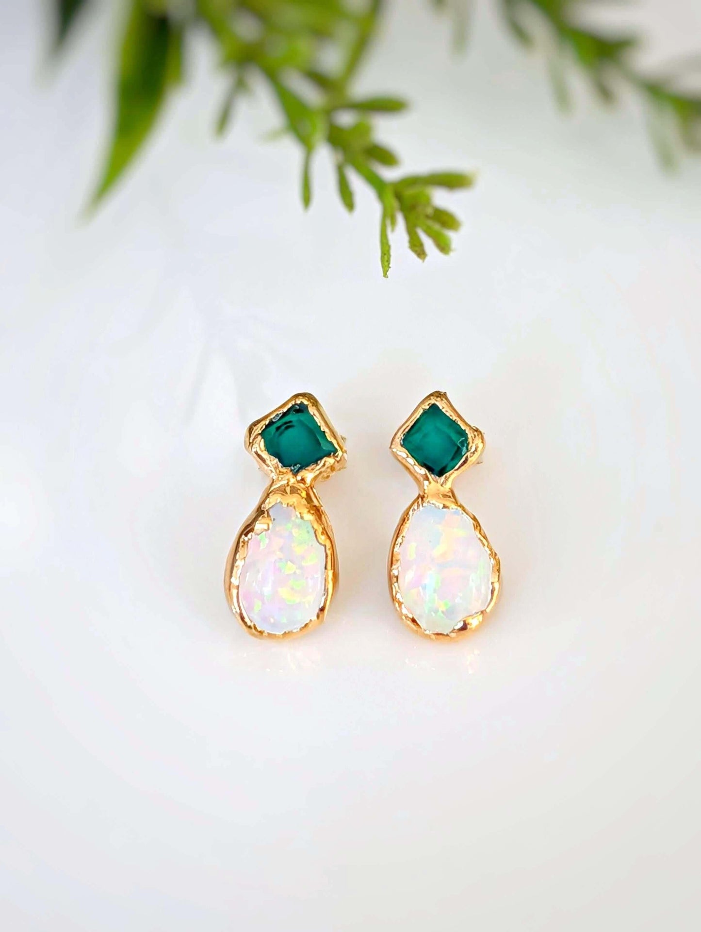 Gold stud earrings with green Emeralds and opal gemstones