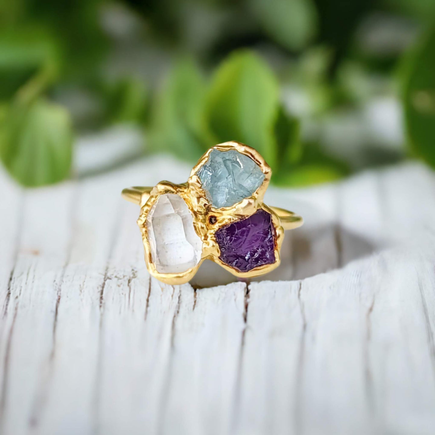 Custom family birthstone cluster ring with raw gemstones in gold setting, ideal Mother's ring or unique gift.