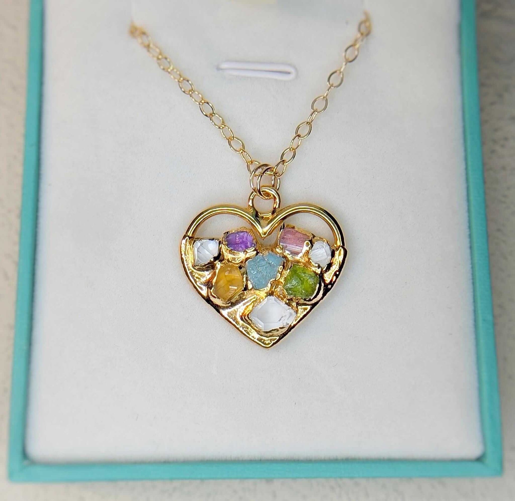 Heart-shaped gold necklace with colorful birthstones, personalized family jewelry gift for mom.