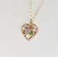 Heart-shaped necklace with birthstones, symbolizing family connections, in gold plating.