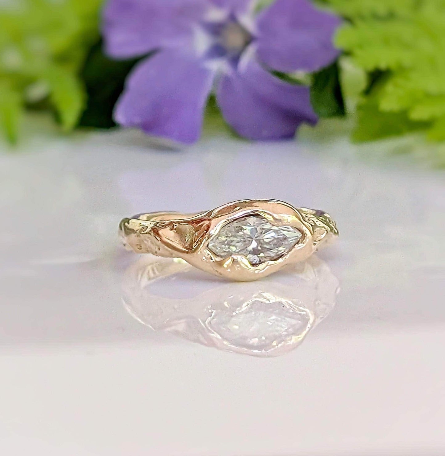 Moissanite Engagement Ring - Solid 14k Gold Textured Band featuring a brilliant marquise stone on a textured band.