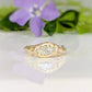 Moissanite Engagement Ring - Solid 14k Gold Textured Band featuring a marquise stone and a textured band.