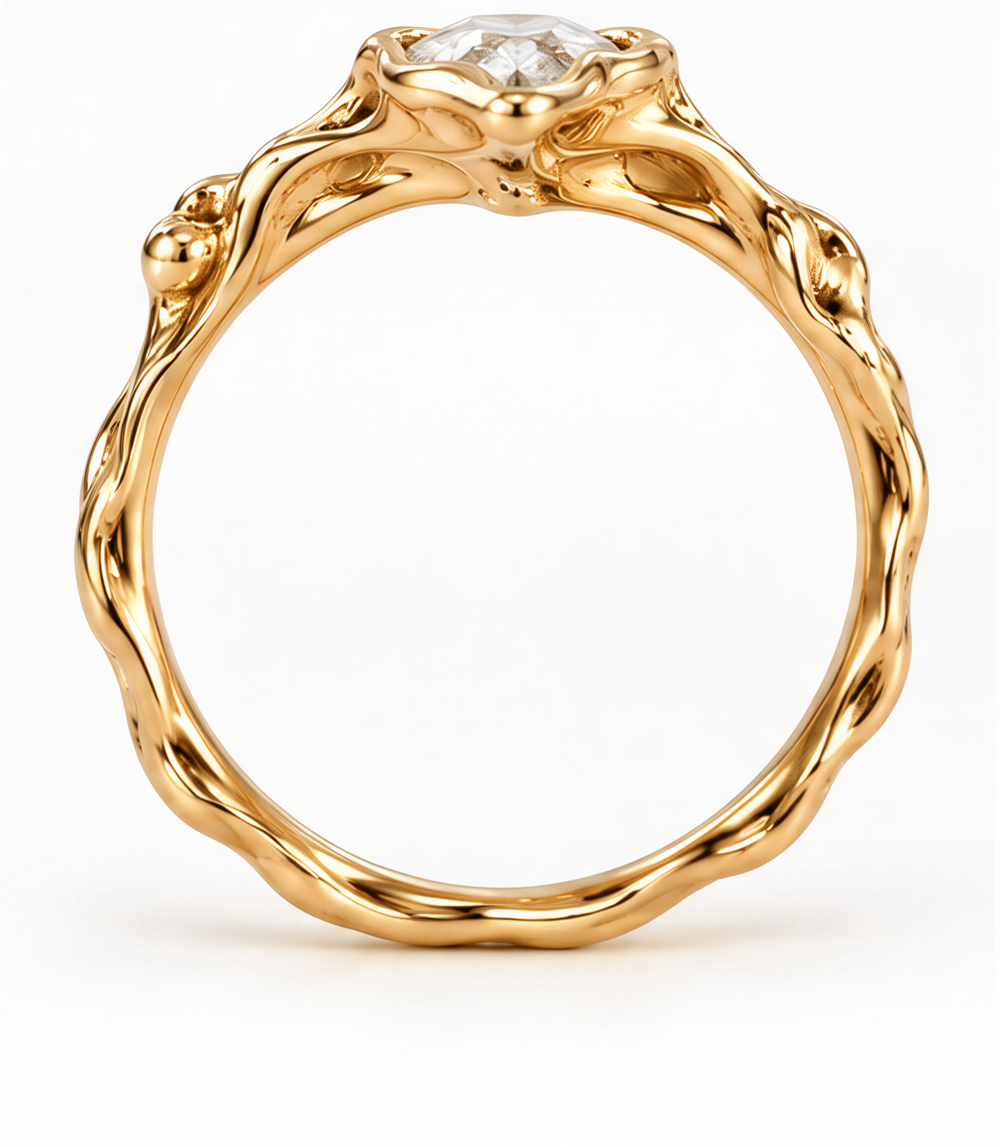 A gold ring with a large central Moissanite and intricate, organic designs around the edges.
