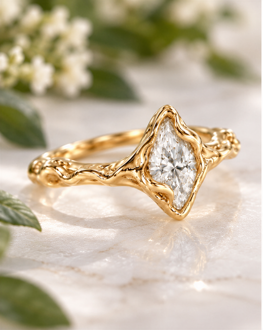 Marquise moissanite engagement ring with organic textured 14k gold band