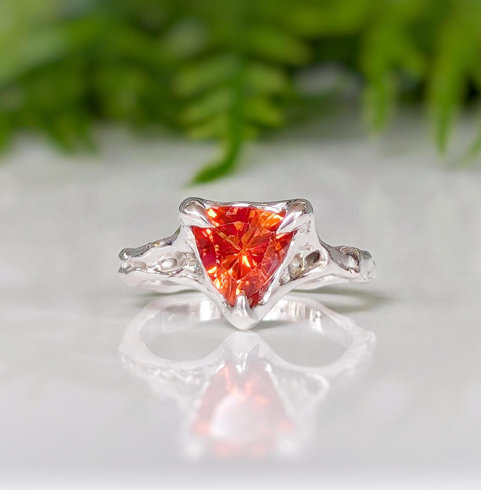 Trilliant cut Orange Sapphire ring in Solid 14k Gold, featuring a unique molten textured band, perfect for engagements.