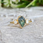 Raw green Sapphire and Herkimer diamond engagement ring on gold band, ideal for a unique promise or engagement ring.