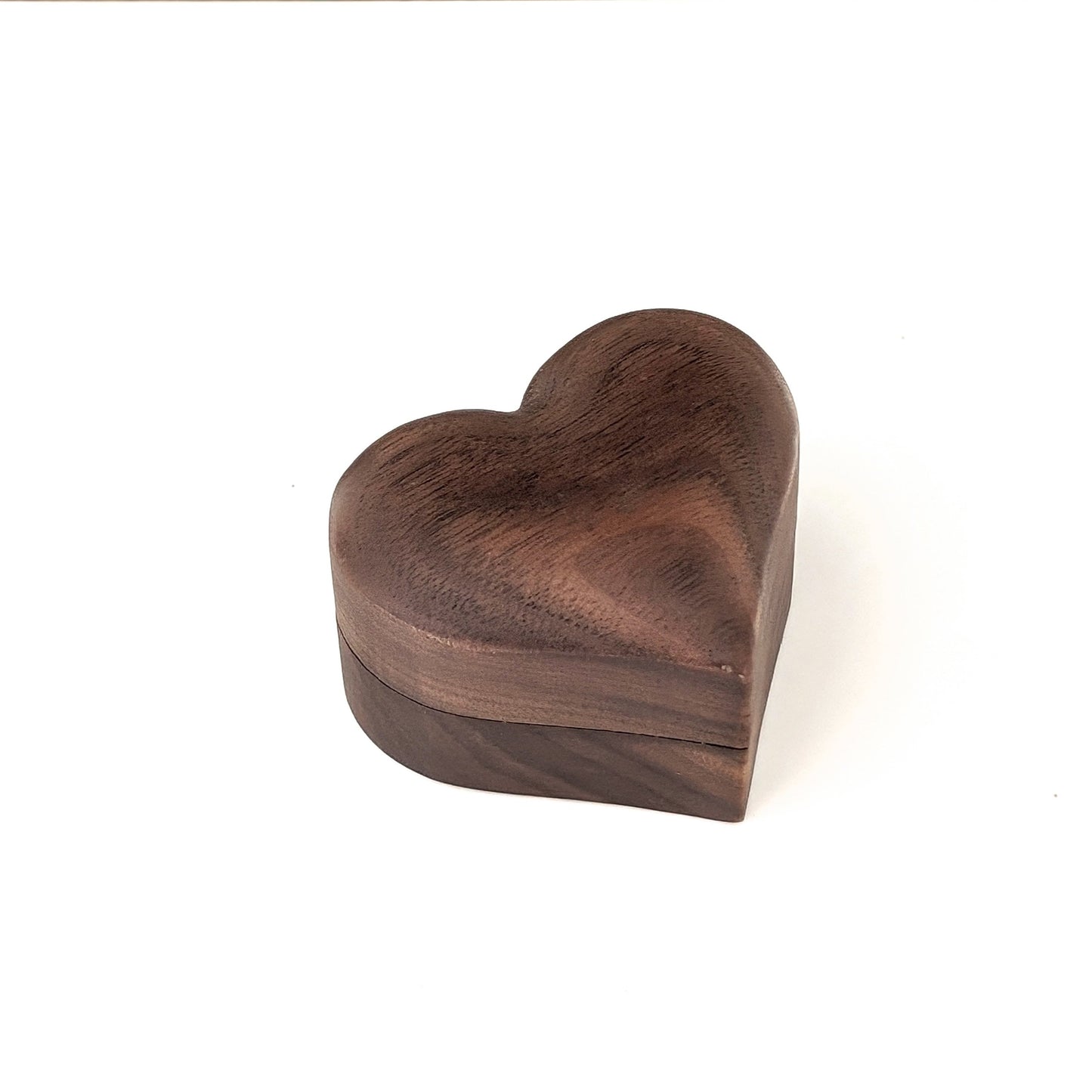 Heart-shaped wooden ring gift box made of walnut, ideal for engagement rings.