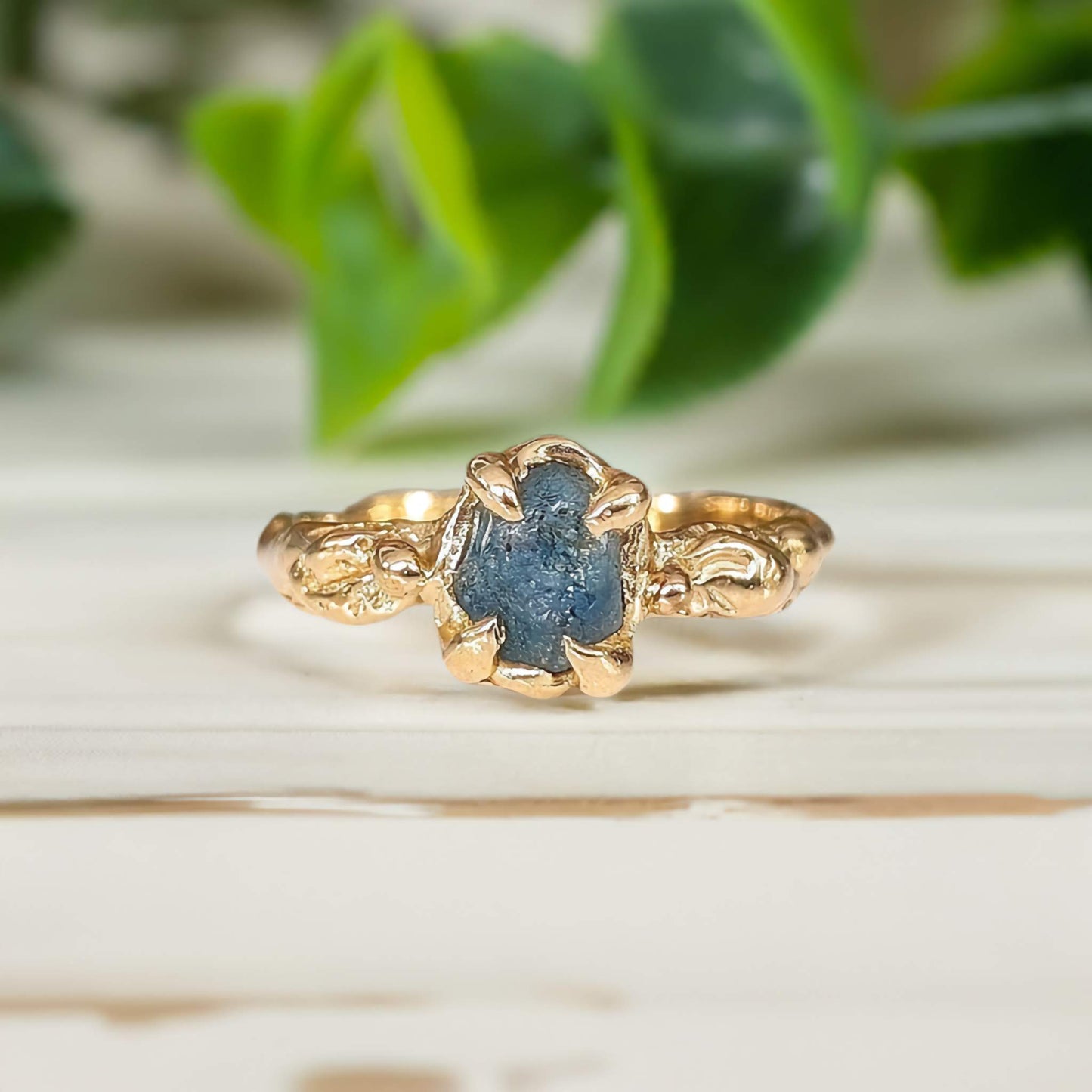 Raw Montana Sapphire engagement ring in Solid 14k Gold with organic textured band, showcasing nature's elegance.