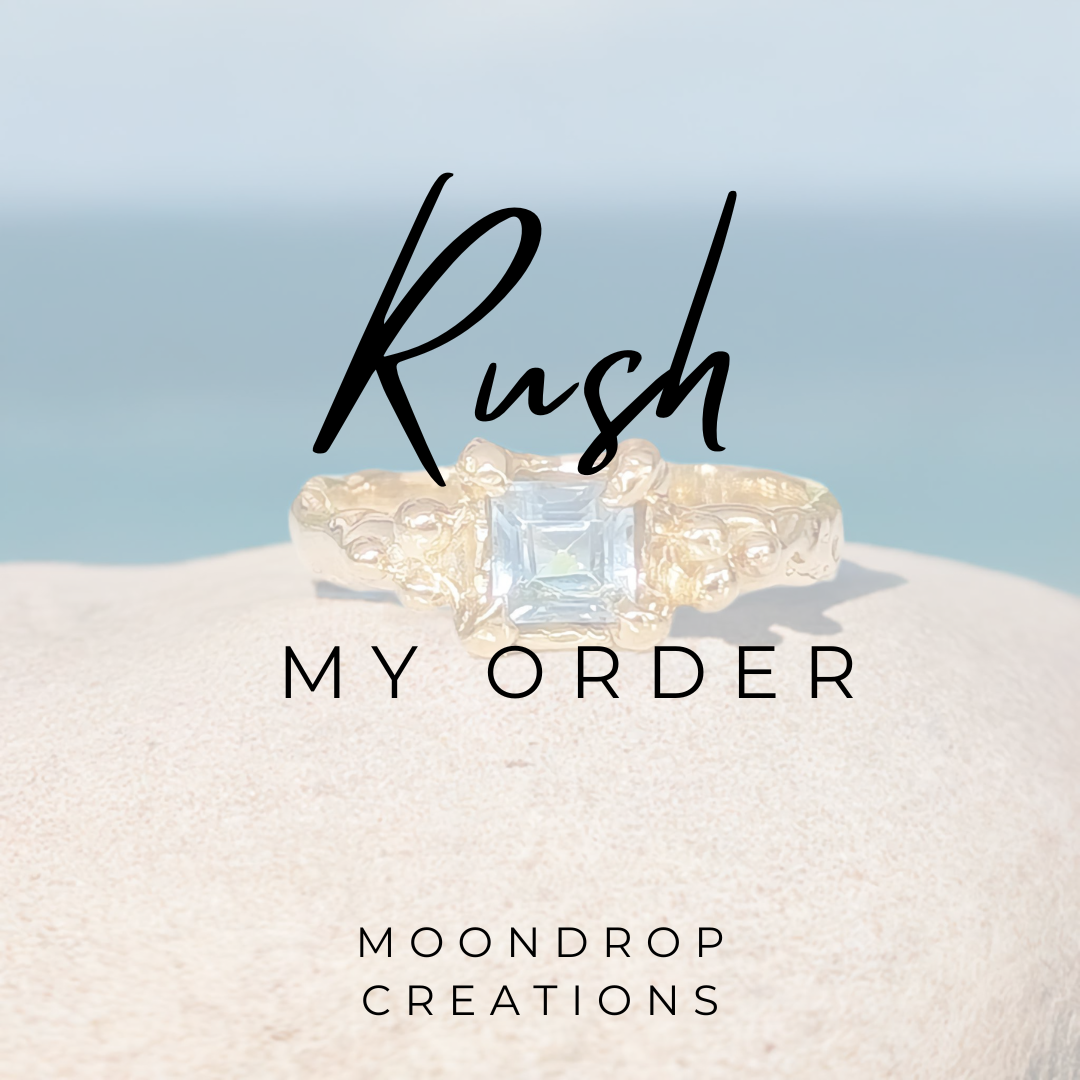 Diamond ring with 'Rush My Order' text and 'Moondrop Creations' branding on a light blue and white background.