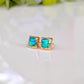 A pair of square shape flashy blue & green Opal stud earrings in Gold organic setting