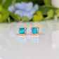 A pair of square shape flashy blue & green Opal stud earrings in Gold organic setting
