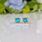 A pair of square shape flashy blue & green Opal stud earrings in Gold organic setting