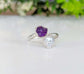 Toi et Moi raw gemstone ring featuring purple and white stones, symbolizing love and family connections.