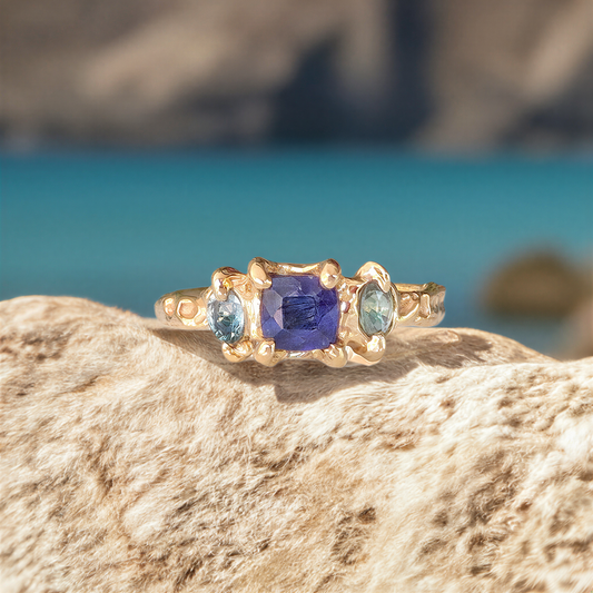 Elegant Blue Sapphire and Tourmaline engagement ring in Solid 14k Gold, showcasing natural stones with a rustic design.
