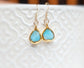 Stunning Amazonite earrings with gold plating, showcasing natural stone in elegant drop design.