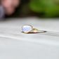 Handcrafted Australian Opal ring set on a 14k gold filled band, perfect for engagements or special occasions.