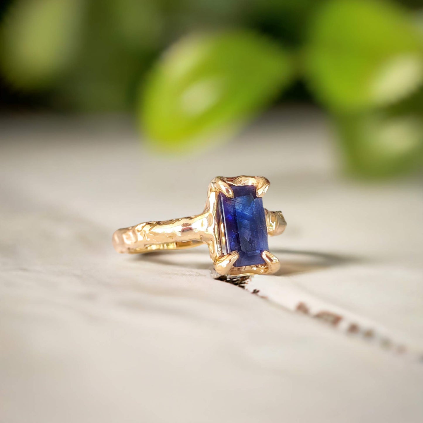 Blue Sapphire engagement ring in Solid Sterling Silver with textured band and emerald shape design.