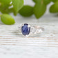 Blue Sapphire and raw diamond engagement ring in textured sterling silver, showcasing nature-inspired elegance.