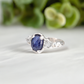 Blue Sapphire and raw diamond engagement ring in solid sterling silver with nature-inspired design.