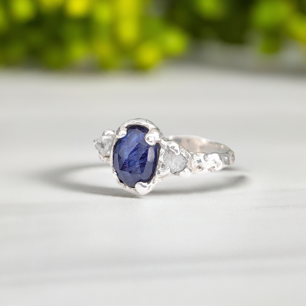 Blue Sapphire and raw diamond engagement ring in solid sterling silver, showcasing natural elegance.