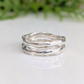 Handcrafted Molten Silver stacking rings showcasing an irregular, nature-inspired design in solid 3mm sterling silver.