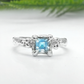 Blue Topaz engagement ring in solid sterling silver with an organic textured band.