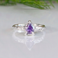Handcrafted Amethyst engagement ring in solid sterling silver with organic textured band and pear-shaped stone.