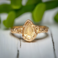Citrine ring in Solid 14k Gold with a pear-shaped yellow crystal, featuring an organic textured band.