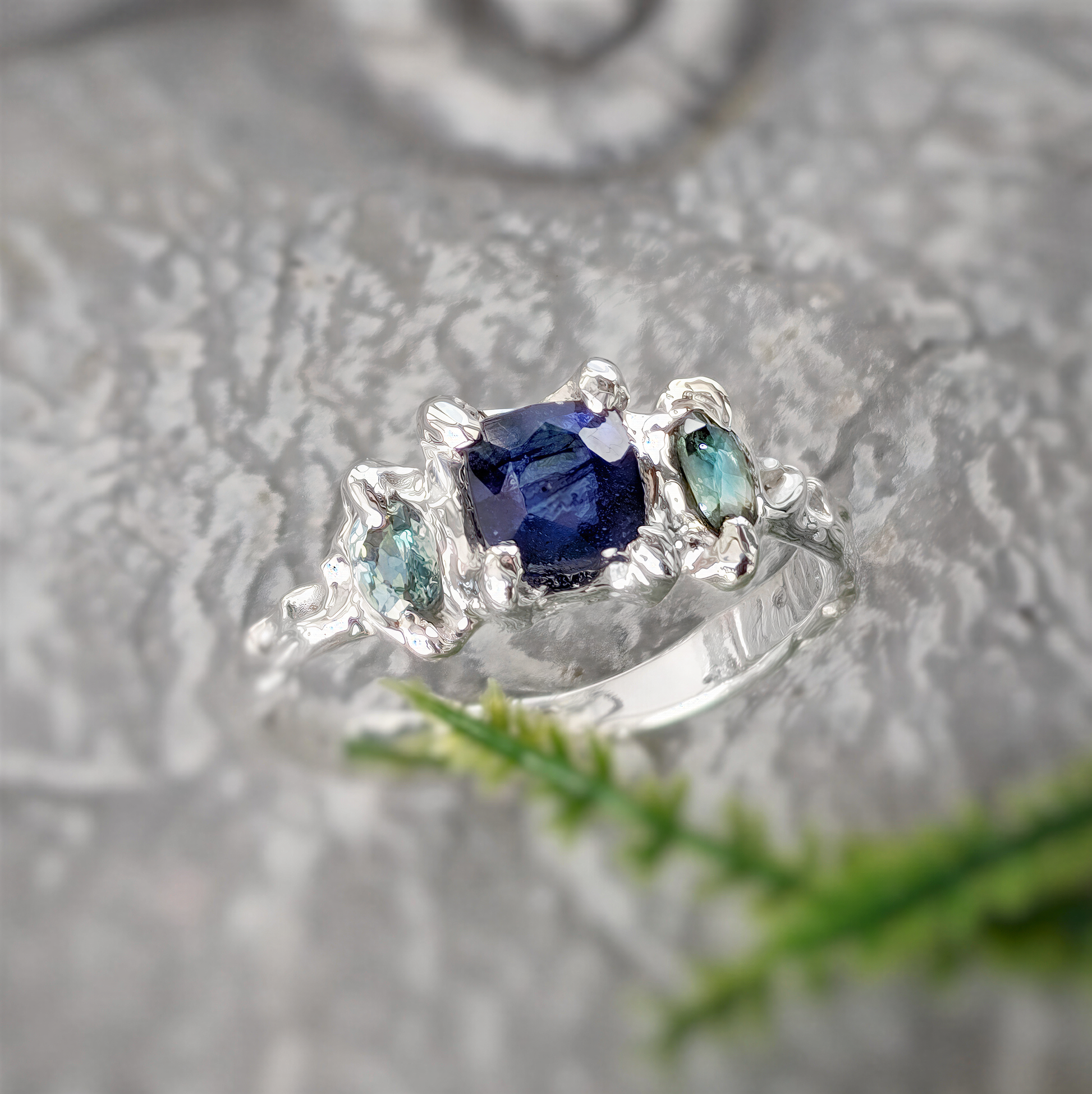 Elegant Blue Sapphire and Tourmaline engagement ring in Solid 14k Gold, featuring a square sapphire and teal gemstones.