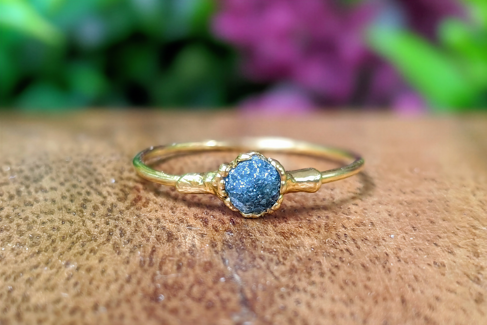 Raw blue diamond engagement ring on solid 18k gold band, handcrafted for unique elegance and perfect for Valentine's Day.
