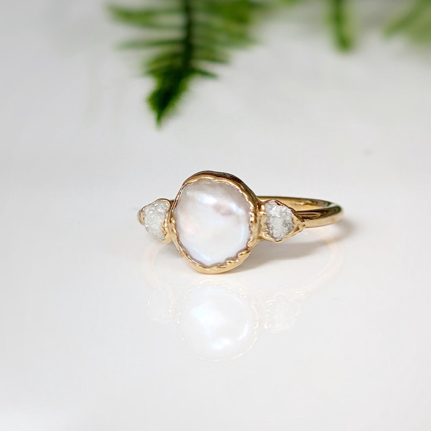 Freshwater pearl engagement ring with raw diamonds, romantic and rustic design, crafted in gold.