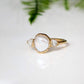 Freshwater pearl ring with raw diamonds set in gold band, perfect for wedding or engagement.