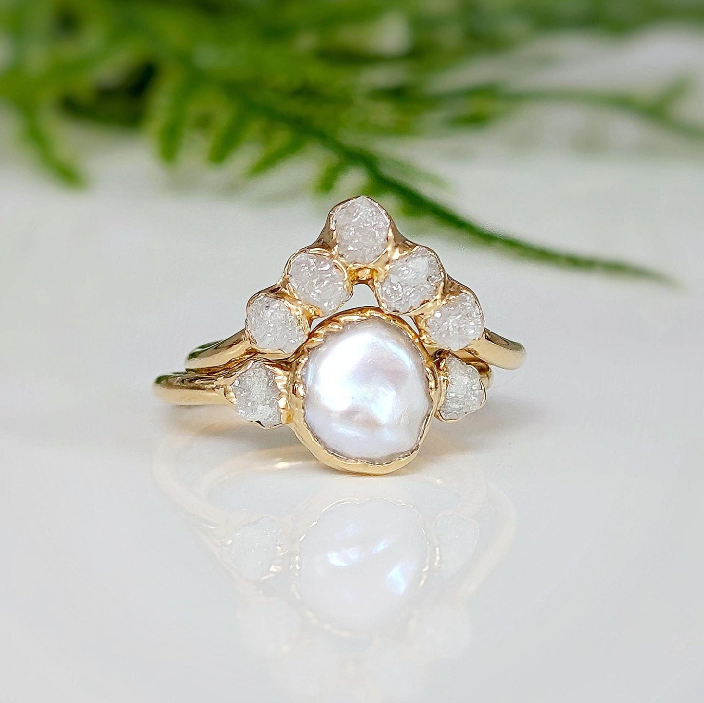 Freshwater pearl and raw diamond wedding ring set with gold band, featuring a rustic romantic design.
