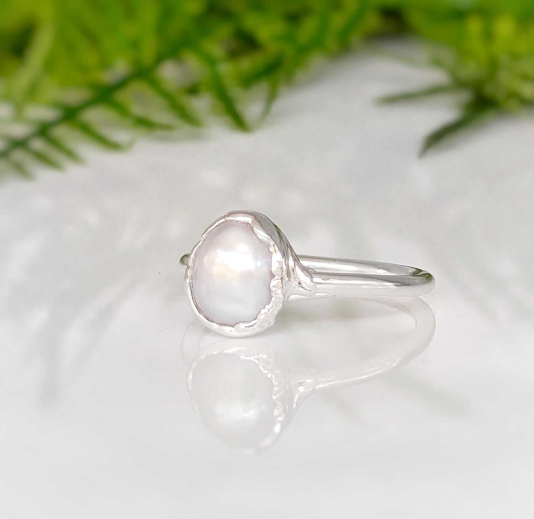 Handcrafted Freshwater pearl ring on sterling silver band, featuring a unique Keshi pearl, perfect for gifts or special occasions.