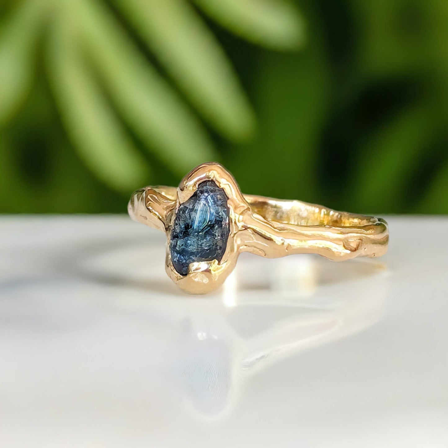 Teal Australian Sapphire ring in solid 14k gold from the 'Pea in a Pod' collection, showcasing a unique organic design.